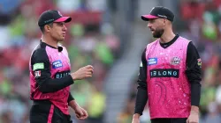 James Vince alongside his skipper Moises Henriques as the Sixers take on Brisbane Heat at the 