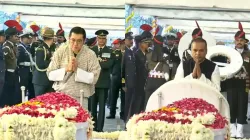 King of Bhutan (left) and Mauritius Foreign Minister (Right) pay tribute to Manmohan Singh.