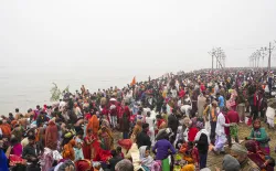 Devotees take holy dip on first 'Amrit Snan'.