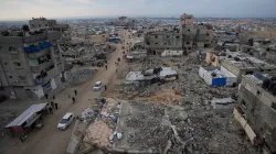 A tent camp for displaced Palestinians is set up amid destroyed buildings in the Khan Younis refugee camp, southern Gaza Strip, Saturday, Jan. 4, 2025