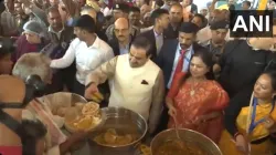 Gautam Adani offers 'seva' at Kumbh Mela