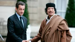 Nicolas Sarkozy and Moammar Gadhafi