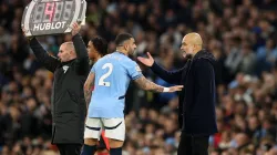 Kyle Walker and Pep Guardiola.