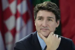 Justin Trudeau reacts to US tariffs, says Canada will have immediate and extremely strong response.