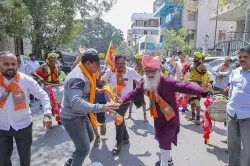 BJP supporters celebrate BJP's victory in Delhi Assembly election. 