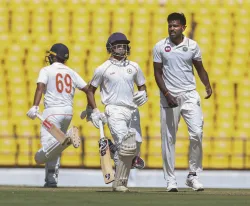 Danish Malewar and Karun Nair against Kerala in Ranji Trophy final