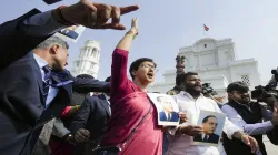 Atishi and other AAP MLAs protesting outside Delhi Assembly