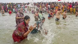 Devotees taking holy dip at Triveni Sangam.