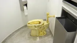 The 18-karat gold toilet in the restroom of the Solomon R. Guggenheim Museum in New York.