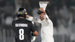 A spectator tried to hug Rachin Ravindra.