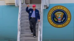 Donald Trump with Air Force One in the background