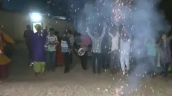 People express joy and burst firecrackers in Jhulasan - the native village of NASA astronaut Sunita 