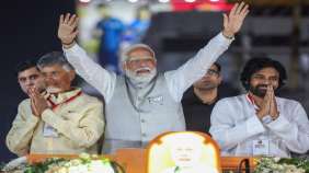PM Modi holds mega roadshow with Chandrababu Naidu, Pawan Kalyan in Vijayawada | PICS 