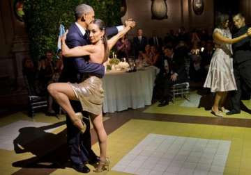 President Barack Obama and first lady Michelle Obama dance the tango 