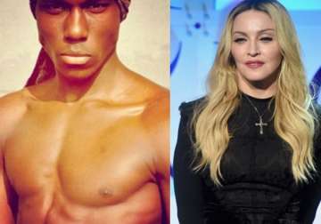 Madonna is smitten by this dishy dude.