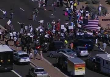 Dozens of protestors blocked traffic near an event 