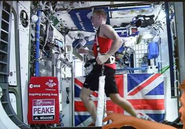 British astronaut Tim Peake sets new record for fastest marathon run in space