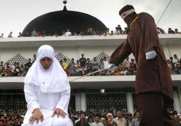Christian woman whipped under Sharia law in Indonesia