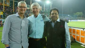 Tim Cook with IPL chairman Rajeev Shukla and TV commentator Alan Wilkins