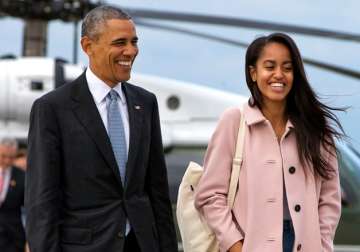 US President Barack Obama with his elder daughter Malia