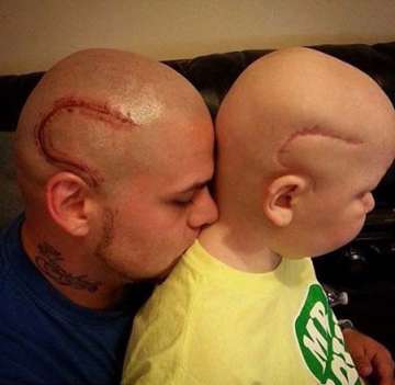 Dad gets matching tattoos as his son 