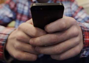 Texting can change the rhythm of brain waves in human