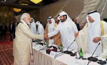Prime Minister Narendra Modi greets Business Leaders of Qatar