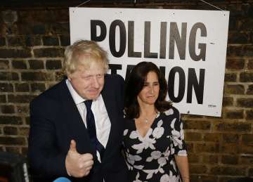 British MP Boris Johnson and his wife Marina after voting in the EU referendum