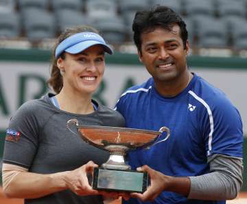Leander Paes partnered with Martina Hingis to win French Open mixed doubles 