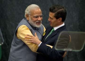 PM Narendra Modi hugs Mexican President Enrique Pena Nieto 