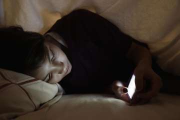 smartphone in bed