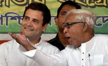 Rahul Gandhi with Buddhadeb Bhattacharya in an election rally during WB polls