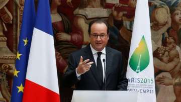 French President Francois Hollande delivers a speech