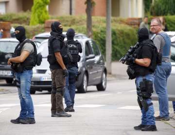 Security personnel at the sight of Normandy church attack