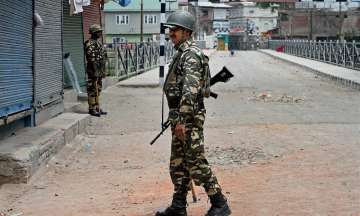 Security jawans guarding at a bridge during curfew and srike in Srinagar