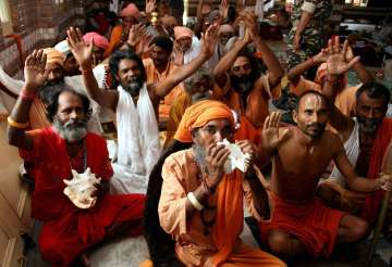 Sadhus at a base camp in Jammu on as Amarnath Yatra was suspended 