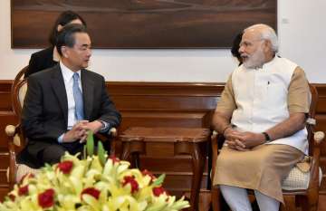 Chinese FM calls on PM Modi