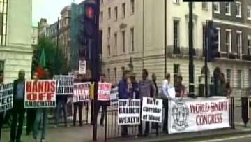 Protester outside Chinese embassy in London