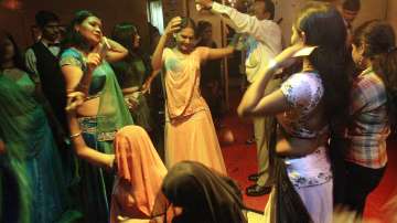 Showering money on girls in dance bars against dignity and culture: SC
