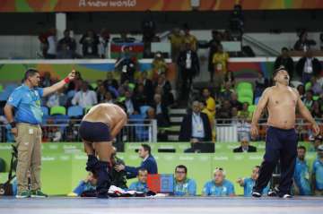 Rio 2016 Mongolian wrestling coaches strip off clothes to protest medal loss