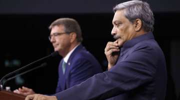 Parrikar and Carter addressing a joint press conference