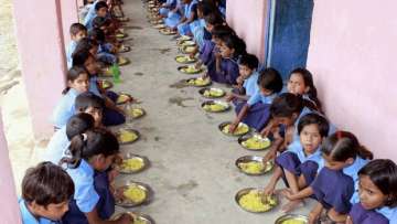 Children eating mid-day meal at a school