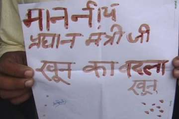 Youths write letters to PM Modi with blood