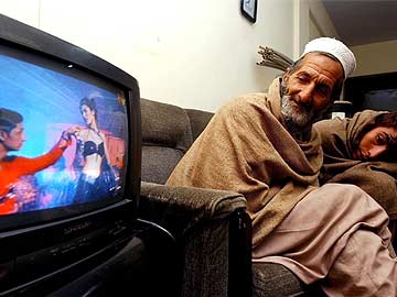 Pak man watching television