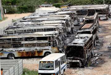 Bengaluru: Charred remains of buses burned during a protest over Cauvery issue