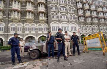 Mumbai police commandos guard the coast along Gateway of India