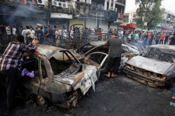 Triple suicide attack rocks north Baghdad | India TV