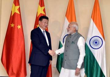 PM Narendra Modi meets Chinese President Xi Jinping in Goa at BRICS 2016