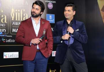 File pic - Fawad Khan and Karan Johar at an event in Mumbai