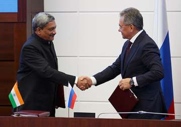 File pic - Sergei Shoigu and Manohar Parrikar shakes hand. 
